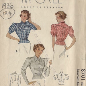 May include: A vintage McCall's sewing pattern for a Junior Miss Blouse, size 14. The pattern includes three different styles of blouses with puffed sleeves and a fitted waist. The pattern number is 8701 and the year is 1936.