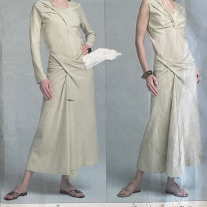 以下が含まれることがあります： 2つの異なるスタイルのドレスの縫製パターン。ドレスは薄いベージュの色で、ドレープのデザインになっています。パターンはヴォーグ製で、イッセイミヤケのデザインです。