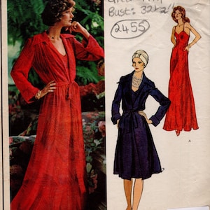 May include: Vintage Vogue Paris Original sewing pattern featuring a red dress and a navy blue coat dress. The pattern includes illustrations of the designs and the text "Christian Dior". The bust size is 82.5 cm.