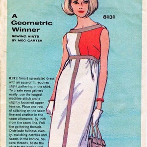 May include: A geometric dress pattern with a white skirt and a red and white bodice. The pattern includes sewing instructions and is for sizes 10-12, 12-14, 14-16, and 16-18. The pattern is called "A Geometric Winner" and is by Meg Carter.