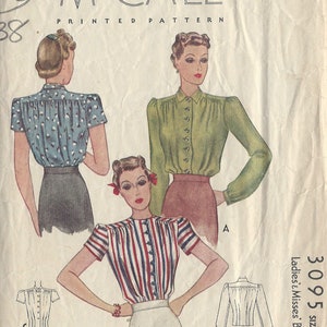 May include: Vintage McCall's sewing pattern for a women's blouse. The pattern is for size 18 and includes three different styles: a short-sleeved blouse with a button-up front, a long-sleeved blouse with a button-up front, and a short-sleeved blouse with a gathered neckline.