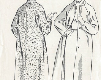 May include: A vintage sewing pattern for a coat, featuring two women wearing different styles of coats. The pattern number is 549, and the bust size is 32 inches. The pattern is from the 1950s.