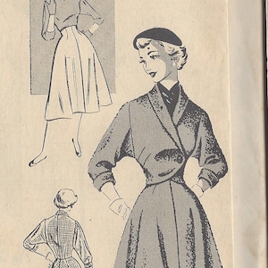 May include: Vintage sewing pattern for a dress with a fitted bodice and a full skirt. The pattern is for size 10 and has the number 2688 printed on it.