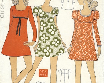 May include: A vintage sewing pattern for a dress with three different styles. The pattern is from le-roy Weldons and is number 8974. The bust size is 36 and the size is 14.