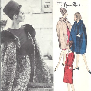 May include: Vogue Paris Original pattern 1217 designed by Nina Ricci. The pattern features three women wearing different styles of dresses and coats. The woman on the left is wearing a black hat, a black dress, and a grey coat. The woman in the middle is wearing a beige coat with a hood. The woman on the right is wearing a blue coat with a white collar.
