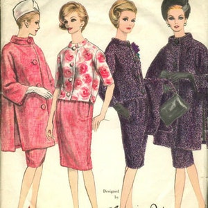 May include: A vintage sewing pattern featuring three women's outfits designed by Christian Dior. The pattern includes a pink coat and skirt, a floral print jacket and skirt, and a purple cape and skirt. The pattern number is 1041.