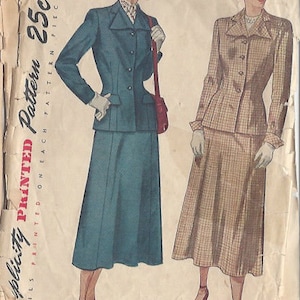 May include: A vintage sewing pattern for a two-piece suit. The pattern includes a jacket with a collar and a skirt. The pattern is printed on paper and has a price of 25 pence. The pattern is from Simplicity.