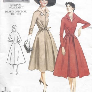 May include: Vintage Vogue Model sewing pattern from 1952. The illustration features two women in dresses, one tan and one red, with a sketch of a dress on the left. The pattern number is 2401, with sizes 12-14-16.