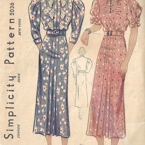 May include: A vintage Simplicity sewing pattern from 1935, featuring two women's dresses with puffed sleeves and a floral print. The pattern number is 2036, and the bust size is 38 inches. The text "Circa 1930s" is also visible.