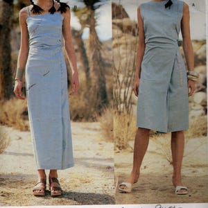May include: Vintage sewing pattern for a dress by Issey Miyake. The pattern is for a long, sleeveless dress with a wrap-style bodice. The pattern is circa 2001 and is for sizes 36-38-40 inches.