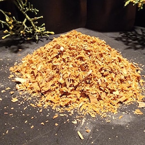 May include: A set of three ceramic mugs with a speckled, matte finish. The mugs are in shades of cream, light gray, and dark gray. Each mug has a simple, minimalist design, perfect for coffee or tea.