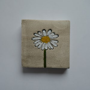 Handmade clay wall picture with marguerite imprint