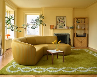 Sofá seccional curvo personalizado a rayas amarillas