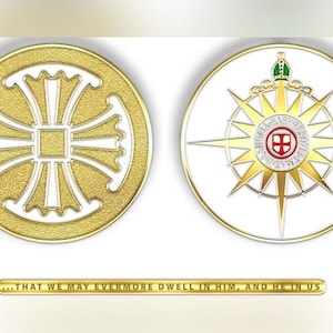 May include: Two gold-colored round medallions with white and red designs. The left medallion features a white cross with a square center. The right medallion features a white star with a red cross in the center. The text below the medallions reads "...THAT WE MAY EVERMORE DWELL IN HIM, AND HE IN US."