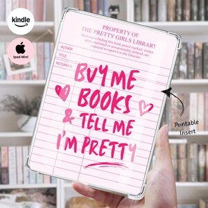 May include: A clear protective tablet case featuring a pink library checkout card insert. The text reads: PROPERTY OF THE PRETTY GIRLS LIBRARY, BUY ME BOOKS & TELL ME I'M PRETTY. The design includes pink hearts and lines for author, title, and returned.