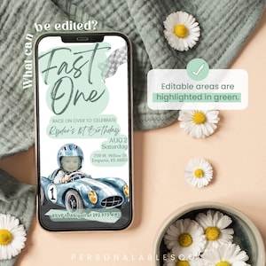 May include: A digital invitation for a first birthday party with a green and blue color scheme. The invitation features a cartoon image of a baby in a race car. The text on the invitation reads "Fast One" and "Race on over to celebrate Ryder's 1st Birthday".