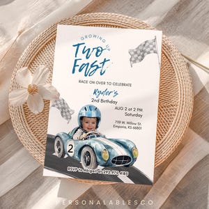 May include: A birthday invitation with a race car theme. The invitation features a baby in a blue race car, the text "Two Fast", and details for Ryder's 2nd birthday.