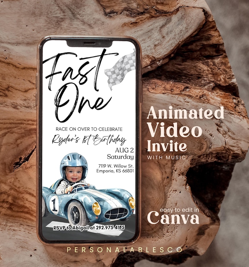 May include: A blue and white animated video invitation for a first birthday party. The invitation features a cartoon image of a baby boy in a race car with the text "Fast One" and "Ryder's 1st Birthday". The invitation also includes the date, time, and location of the party. The text "Animated Video Invite with Music" is displayed at the top of the invitation.