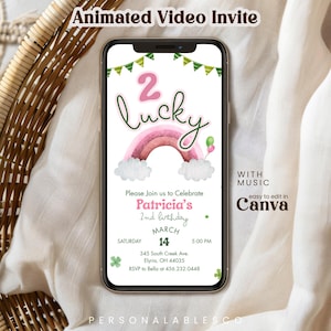 以下が含まれることがあります： スマートフォンには、虹と「2 Lucky」の文字が入った誕生日招待状が表示されています。招待状には、パトリシアの2歳の誕生日、日付、時間、場所の詳細が含まれています。「Animated Video Invite」の文字が上部にあります。