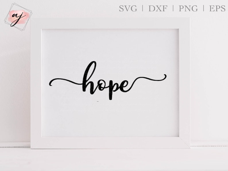 May include: A white framed print with the word "hope" written in black cursive script.