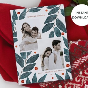 Peut inclure: Une carte de v&oelig;ux blanche avec un motif aquarelle de feuilles vertes et de baies rouges. La carte pr&eacute;sente deux photos d'un couple, avec le texte "Happiest Holidays" et "Anastasia et Felipe" en rouge. L'ann&eacute;e 2021 est &eacute;galement incluse en rouge.