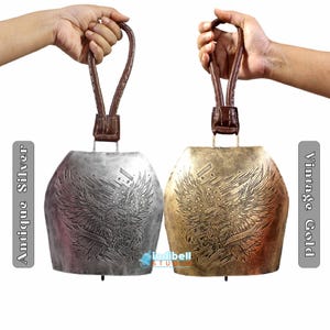 The bell is available in 2 finish, vintage gold and antique silver. Both of them have the same color of leather strap.