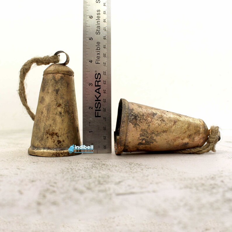 These bells are around 4 inch tall and the diameter is around 2.25 inch.