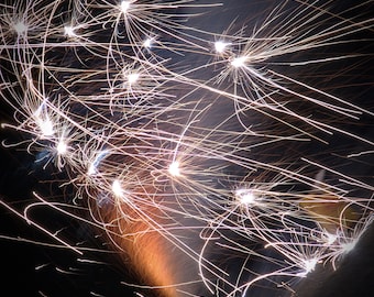 Light painting with fireworks, firework galaxy abstract photo, stars in the galactic winds
