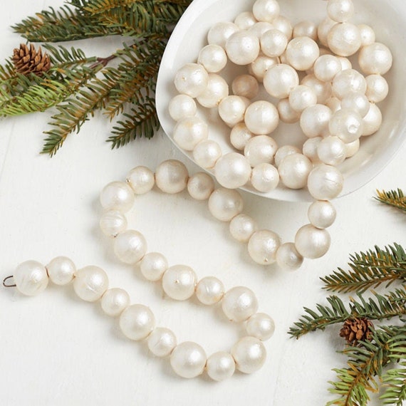 Balsam fir Christmas tree with faux pearl bead garlands double swags  interspersed w/garlands o…