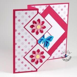 May include: A pink and white card with a pink and yellow flower and a blue butterfly. The card is folded in a unique way to create a three-dimensional effect.