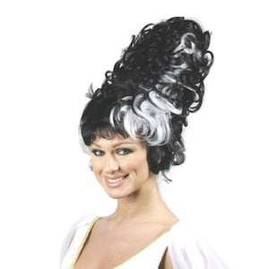 May include: A black and white wig styled in a high, voluminous updo. The wig features a combination of black and white curls, with a dark fringe. The overall style is reminiscent of a classic bride or a costume for a themed event.