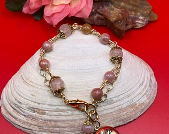 Rose quartz and sunstone wire wrapped bracelet.