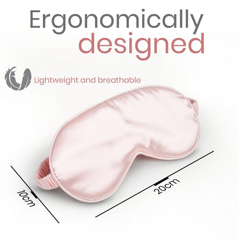May include: A pink satin sleep mask with an ergonomic design. The mask is 20 cm long and 10 cm wide. Lightweight and breathable.