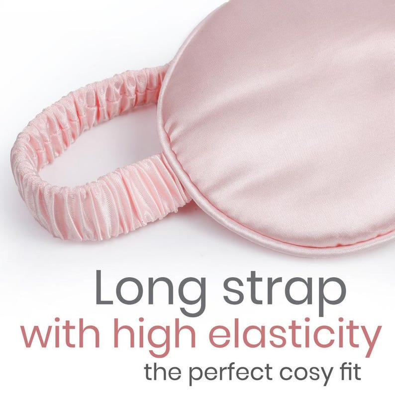 May include: A pink satin sleep mask with a long, elastic strap.  The strap is gathered and has a soft, comfortable feel.
