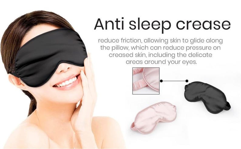 May include: Two silk sleep masks, one black and one pink, are shown on a white background. The text "Anti sleep crease" is displayed above the masks. The text explains that the masks reduce friction, allowing skin to glide along the pillow, which can reduce pressure on creased skin, including the delicate areas around your eyes.