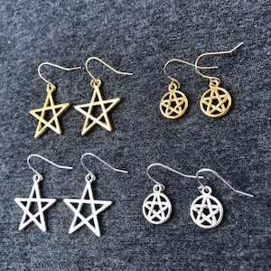 May include: Set of six gold and silver earrings featuring a pentacle design. The earrings are available in two styles: a five-pointed star and a circle with a five-pointed star inside.
