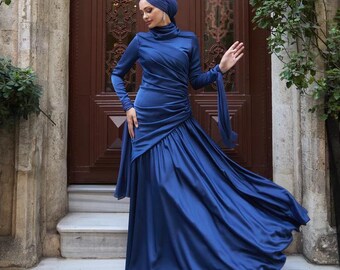 blue dress with hijab Woman Wearing in a Blue Elegant Dress and a Hijab Free Stock Photo
