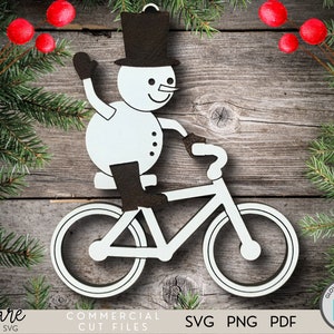Snowman Ornament SVG - Bicycle Ornament Svg - Ornamento di Natale - Pupazzo di neve su una bicicletta - Laser - Cut File - Glowforge - Personalizzato