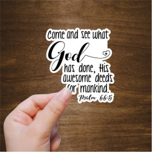 May include: White sticker with black text that reads "Come and see what God has done, His awesome deeds for mankind. Psalm 66:5".