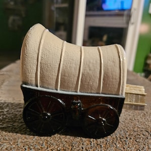 Avon 1970s covered wagon decanter #1870