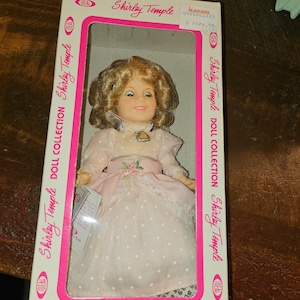 1982 ideal Shirley temple doll in pink dress#234 brown eyes