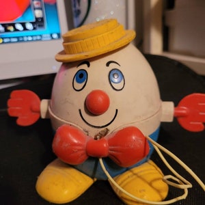 1960,s fisher price humpty dumpty pull toy #1253