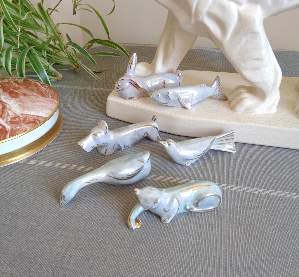 Lot de 4 anciens portes couteau en porcelaine de Limoges en