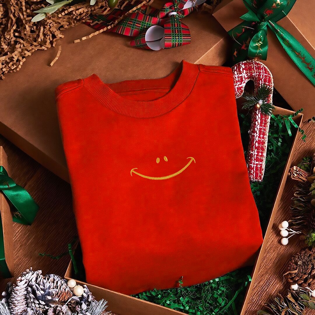 HAPPY FACE FLORAL PRINT KNIT SWETAER main image 0