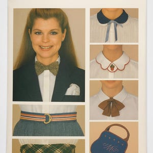 May include: A vintage Butterick pattern sheet showing a woman in a blazer and bow tie, with examples of collars, belts, and a blue handbag. The text "Butterick" and "One Size" are visible.