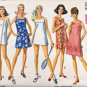 May include: Vintage Simplicity sewing pattern 8203 featuring six mini-dresses. The dresses are in various colors and patterns, including yellow, white, blue floral, white with a scalloped edge, red with white polka dots, and pink with floral trim. The pattern includes sizing information.