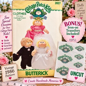 May include: A Butterick Cabbage Patch Kids sewing pattern envelope, number 3927, featuring illustrations of dolls in formal attire, including a bride and groom. The package includes iron-on transfers and is labeled as an uncut vintage 1986 pattern.