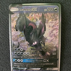 I'm looking to get my bro a gift. He loves Leafeon and is currently  collecting. Which do you think is best? : r/pokemoncards