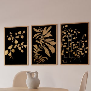 Set di 3 stampe artistiche da parete con motivi floreali e botanici in nero e oro / Arredamento moderno e di lusso per la casa