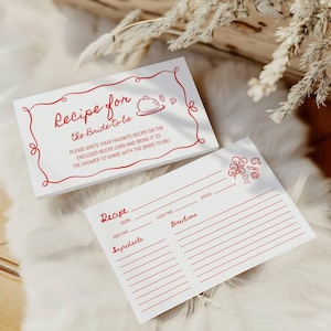 May include: White recipe cards with red text and illustrations. The top card reads "Recipe for the Bride-to-be" with instructions. The bottom card has lines for recipe details. A decorative border and food icons are included.